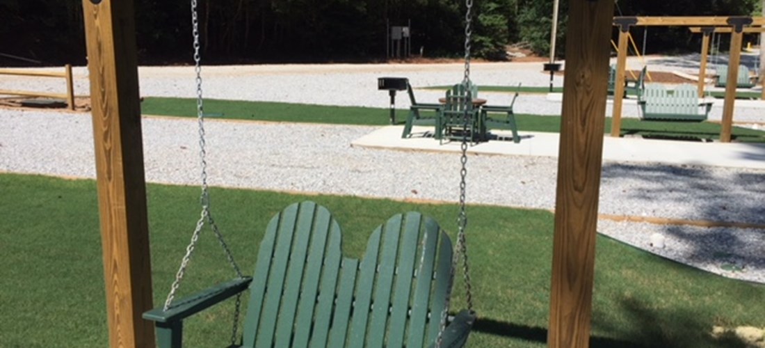 Swing on KOA Patio Sites in New section in rear of park.