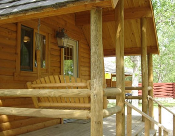 Our cottages, also called Deluxe cabins, have indoor plumbing.  No need to run to the bath house in the dark! Some of our deluxe cabins sleep as many as six people.  Linen packages can be rented: $20/two people, $10/one person.