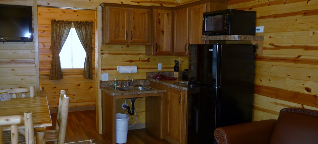 The kitchen and living room have many amenities to make your stay comfortable.