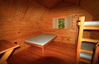 The inside of a camping cabin.