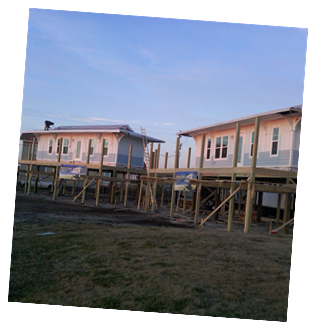 New Deluxe Cabins on stilts at sunset