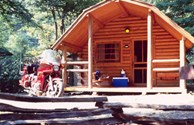 Our kabins are shaded by tall mountain trees