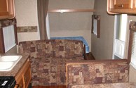 Sofa & Sleeping Area in Trailer Rentals