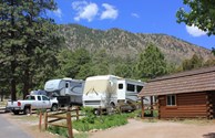 One of our camping cabins and 40 ft RV's. We are big rig friendly~
