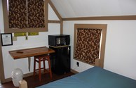 Interior of one of our charming one room camping cabins...we have log cabins and cottages.