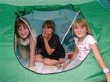 Tenting near a camping kitchen, and the bathrooms and show