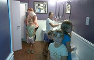 Girl Scouts helping to clean