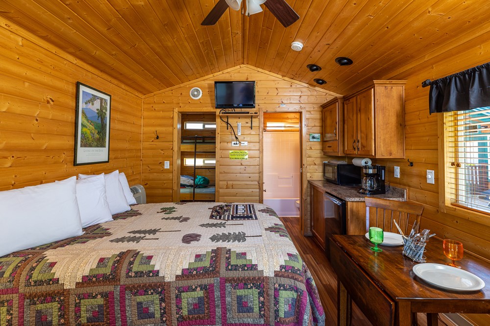 Deluxe Cabins: Linens included! No need to pack sleeping bags! Better than a Hotel!
