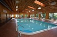 Heated Indoor Pool and Hot Tubs Await You. Photo