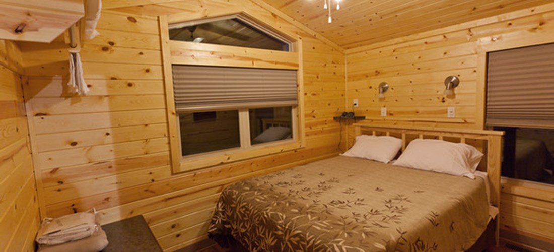 .Master Bedroom in Deluxe Cabin Floor Plan 28 and 33
