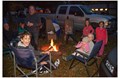 Friends Gather Around The Campfire