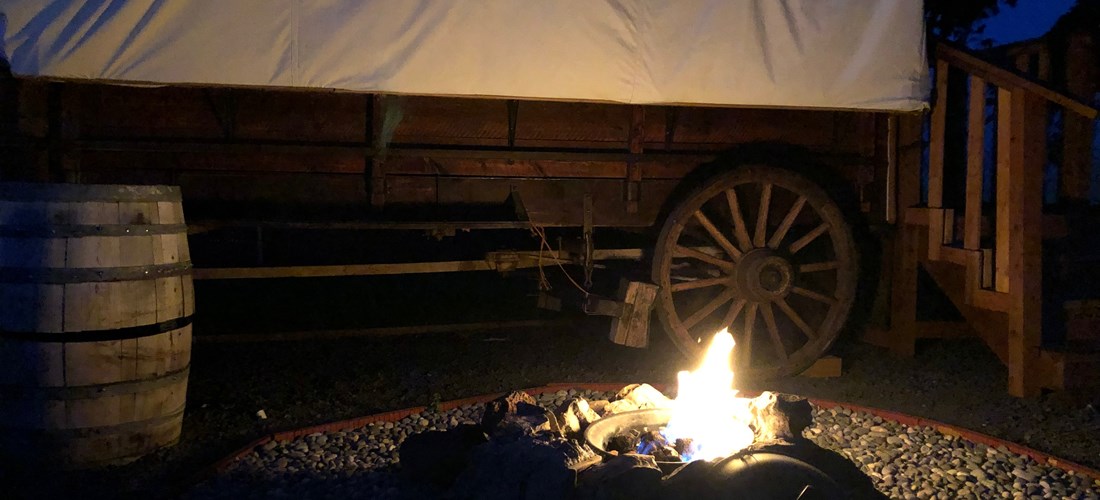 Covered Wagon campsite at night