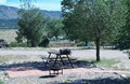 Patio with firepit, grill, table