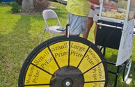 Spin the prize wheel when you donate cans for Care Camps