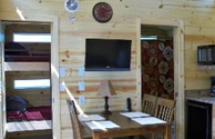 Deluxe Cabin Dining/Bath/Bunks