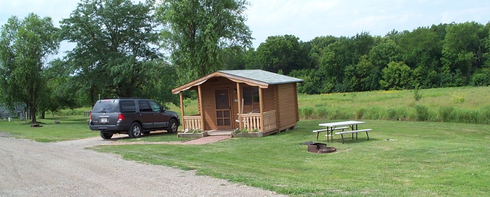 Standard Cabin with Porch Swing, Picnic Table, and Fire Ring