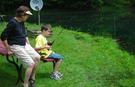 Jesse and Gramma fishing by the pond