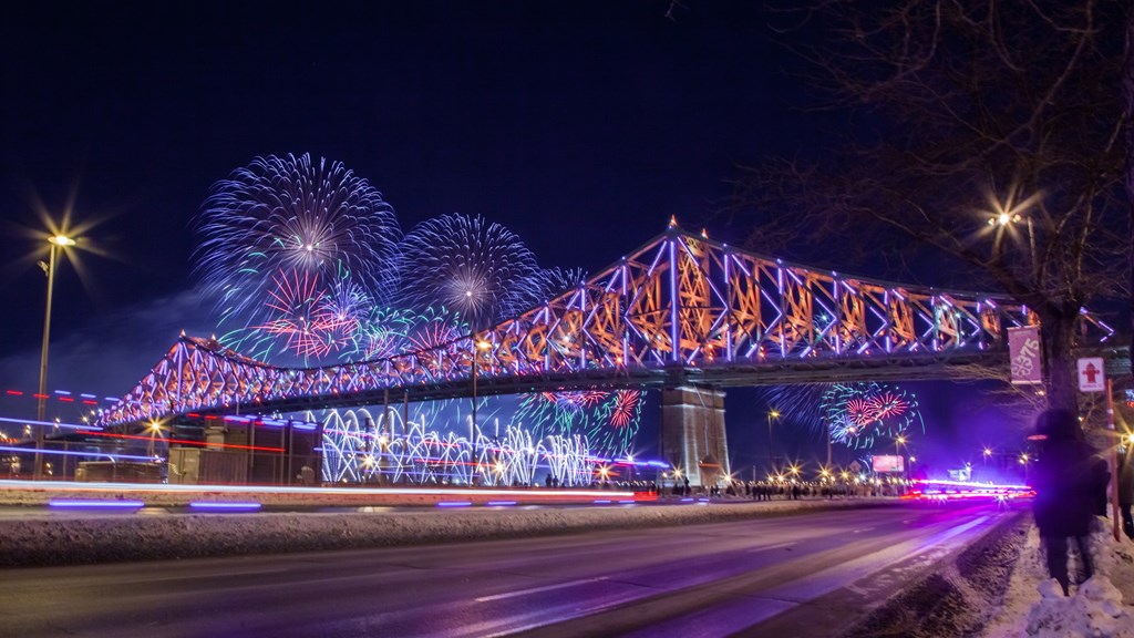 Fireworks-in-the-background-of-the-Jacques-Cartier-Bridge-Montreal-Quebec