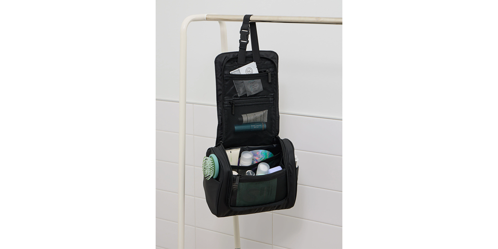 Hanging toiletry bag on a white background.