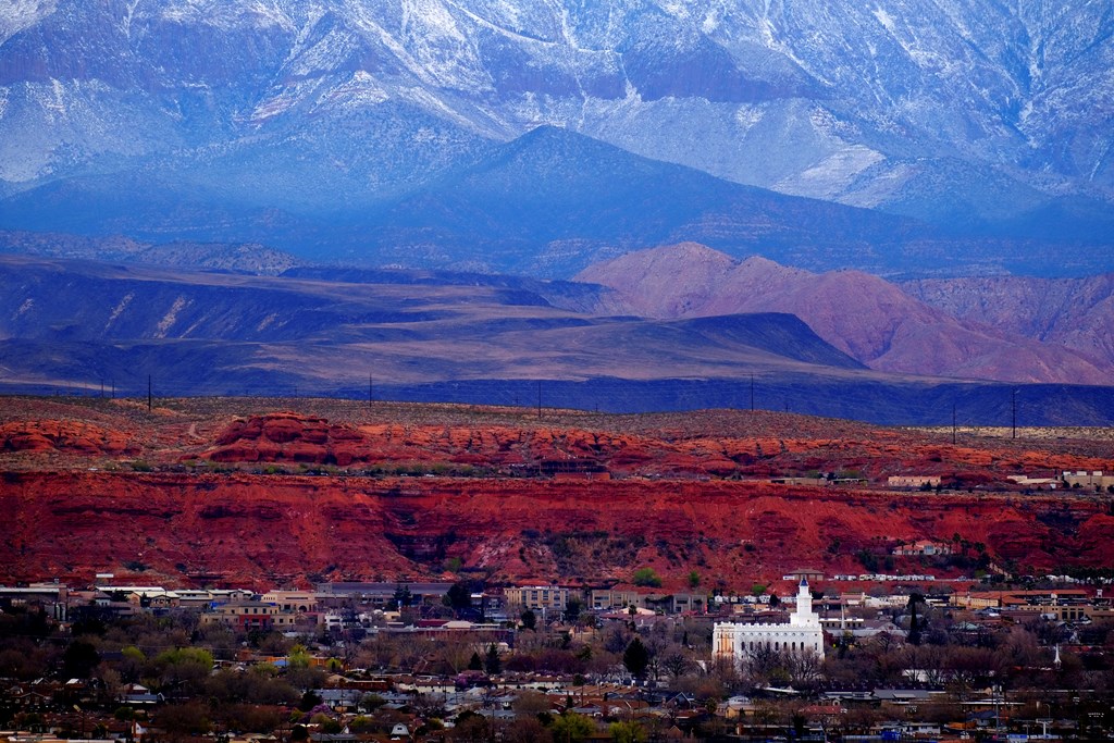 View of St. George Utah valley with red rocks and snow covered mountain