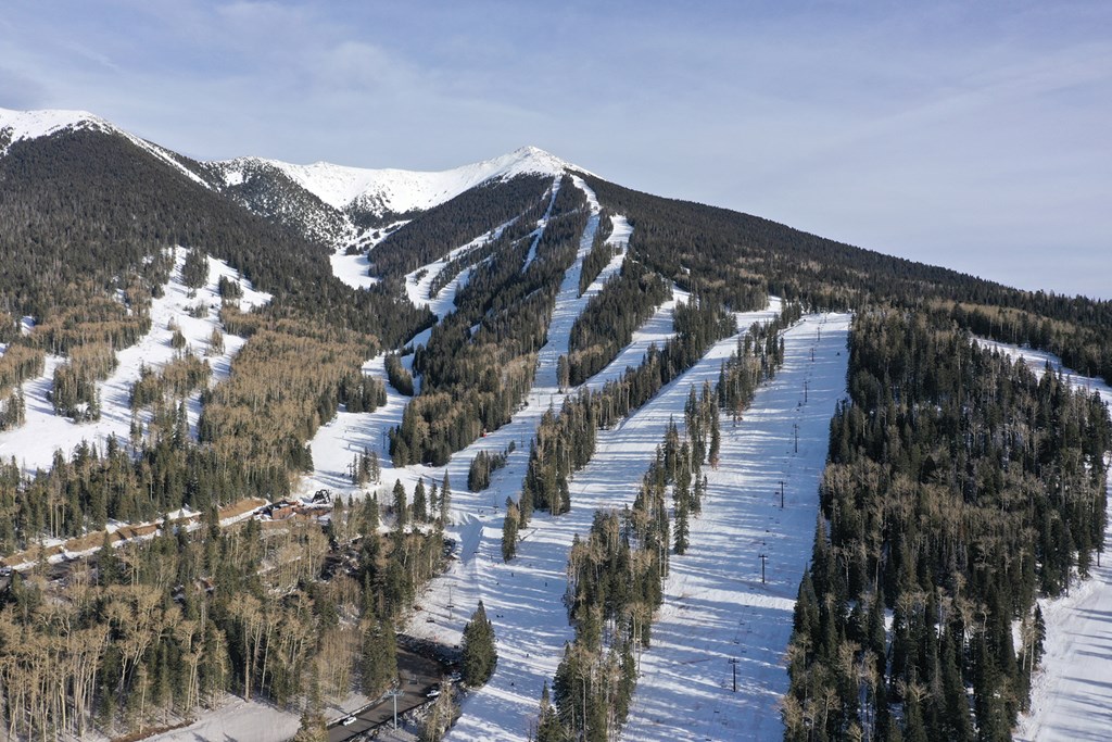 Arizona Snowbowl is an alpine ski resort in the southwest United States, located on the San Francisco Peaks of northern Arizona, seven miles (11 km) north of Flagstaff. The Snowbowl ski area covers approximately one percent of the San Francisco Peaks, and its slopes face west and northwest.