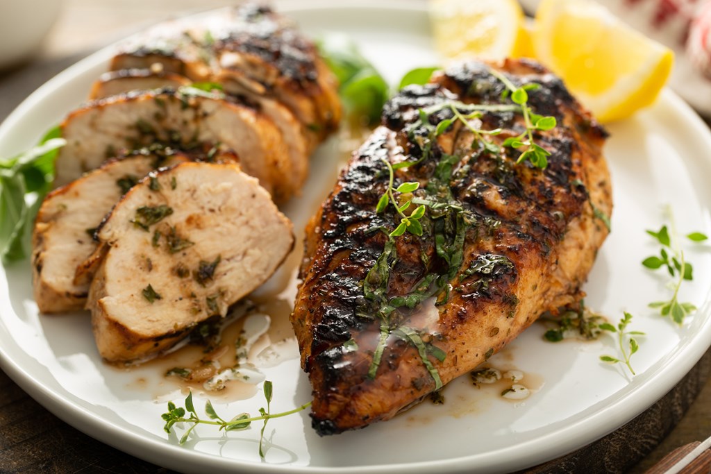 Balsamic grilled chicken breast with fresh herbs 