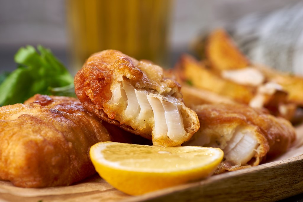 Closeup of the a piece of beer batter fish.