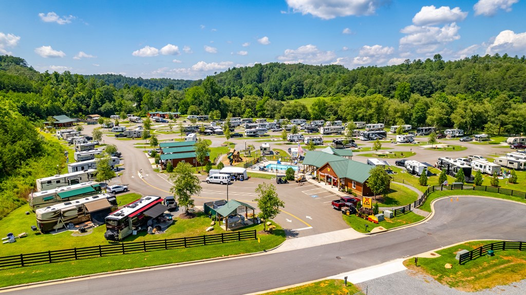 Aerial view of the Blue Ridge / Toccoa KOA Holiday nestled among green rolling hills.