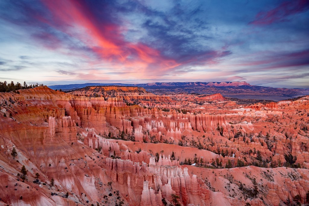 cloudy sunset on the red hoodoos of the Bryce Canyon National Park