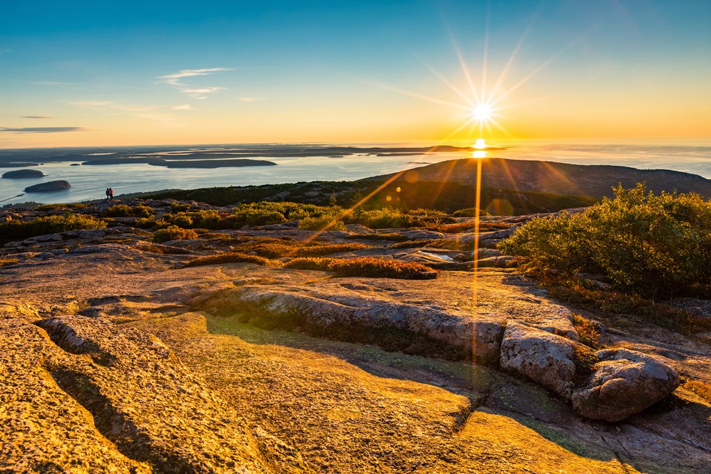 Sunrise in Acadia National Park observed from the top of Cadillac mountain.