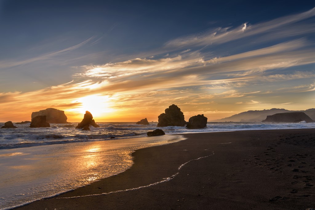 Panoramic view of California coastline at beautiful sunset with Ocean Waves Crushing onto the Shore, California, USA