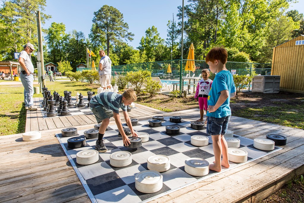 An extra large outdoor checker game at a KOA campground.
