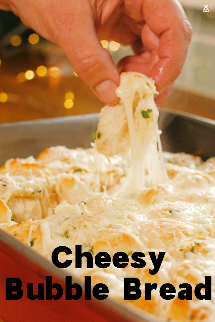 Oh so cheesy and totally delicious, this easy recipe for cheesy bubble bread is sure to be a hit at your next party or family gathering.