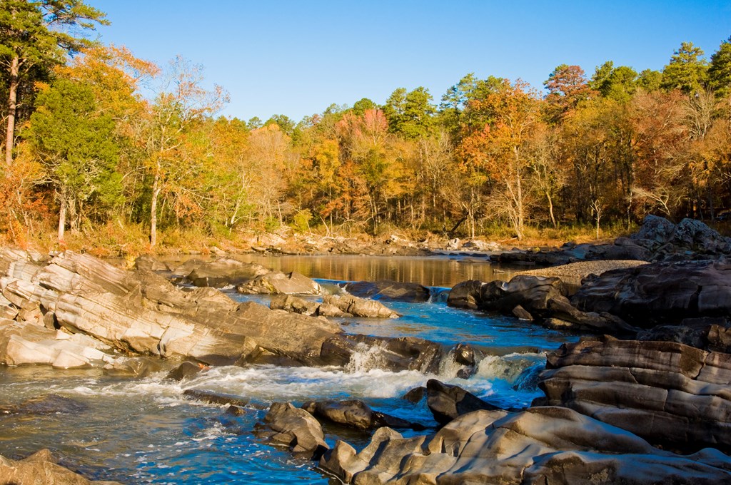 Fall colors frame the background of the Cossatot River in November.
