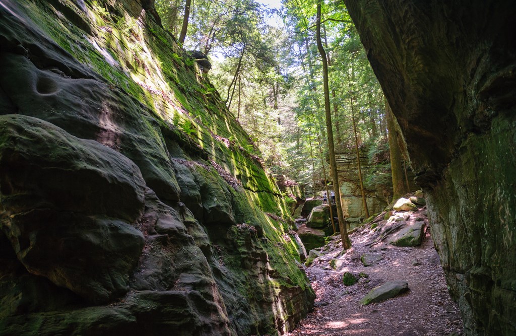 Rock outcroppings surround a trail at Cuyahoga Valley National Park.