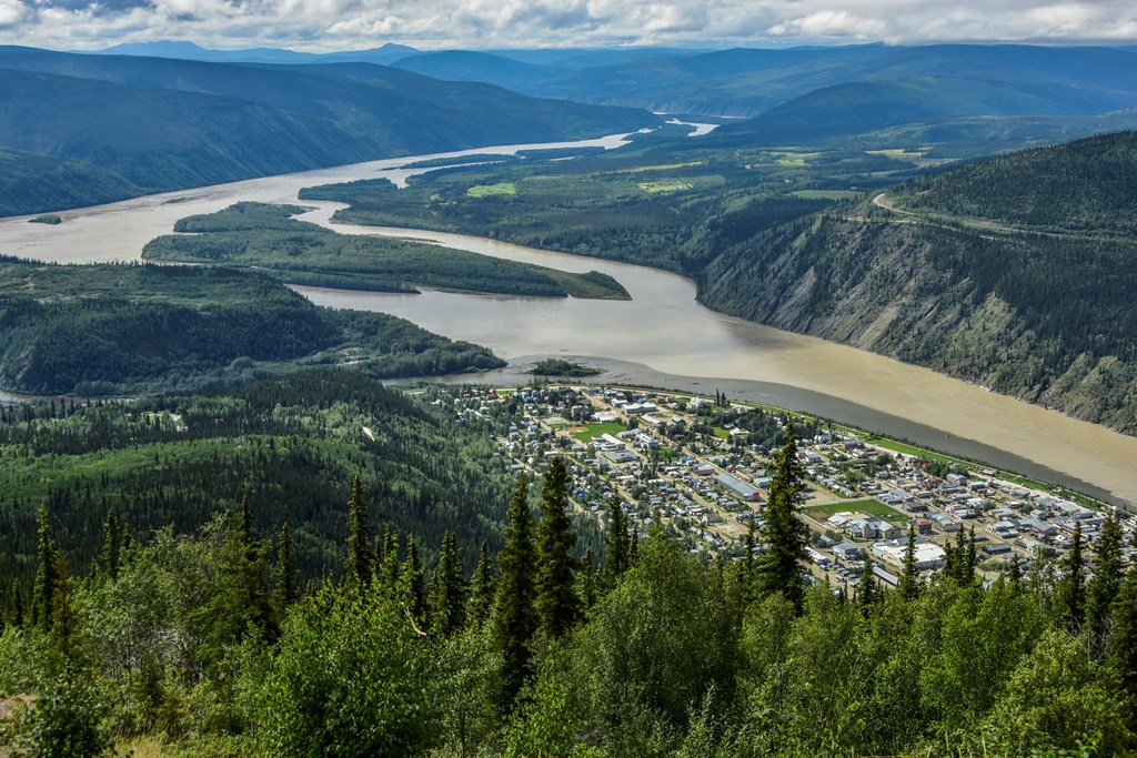 History of the gold rush era is alive in the small remote city of Dawson in the Yukon, Canada. View from Midnight Dome Lookout.