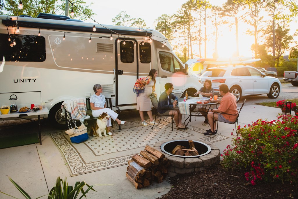 Family enjoying an RV site with KOA Patio