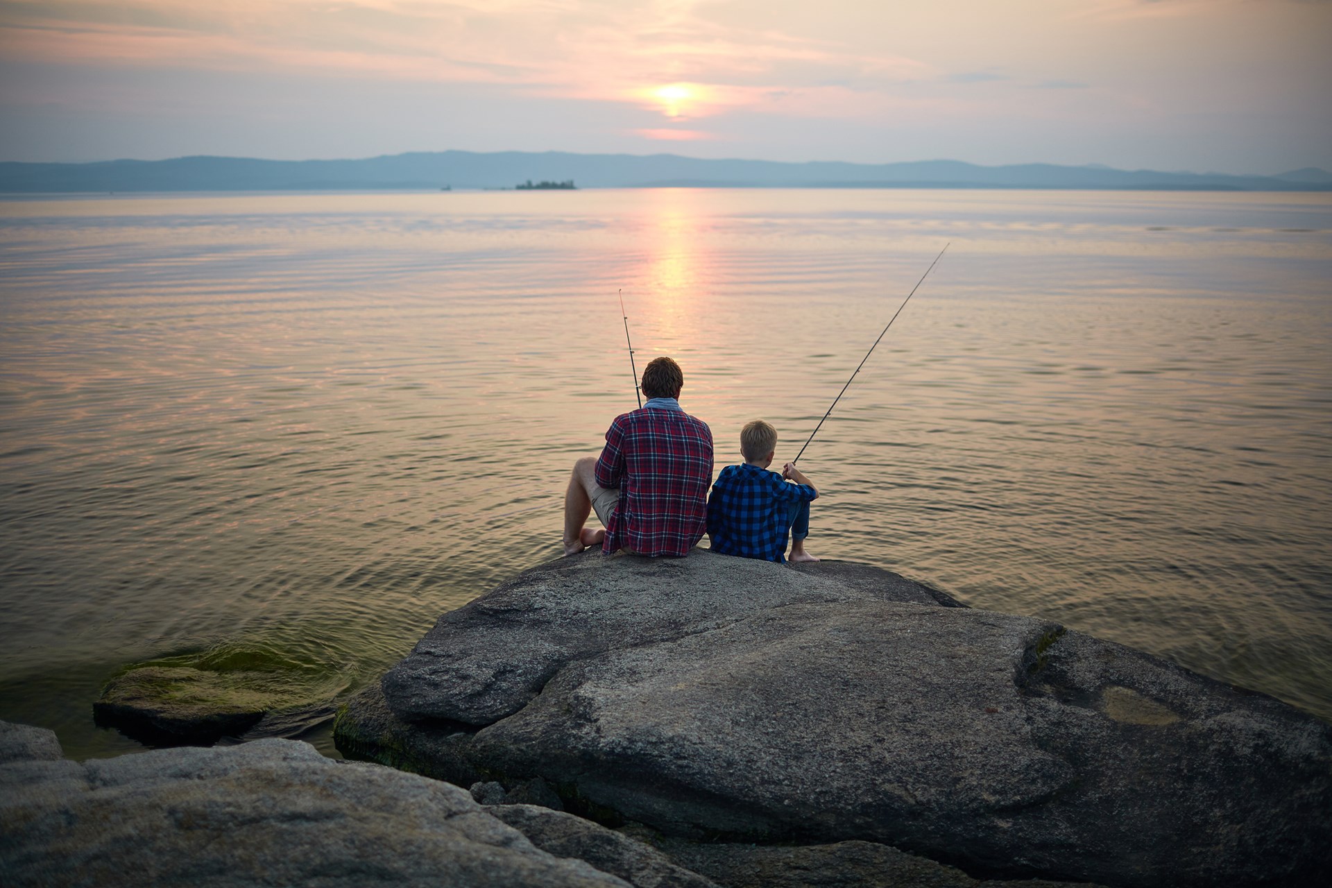 Dad And Son Fishing On The Sunset Together Stock Illustration