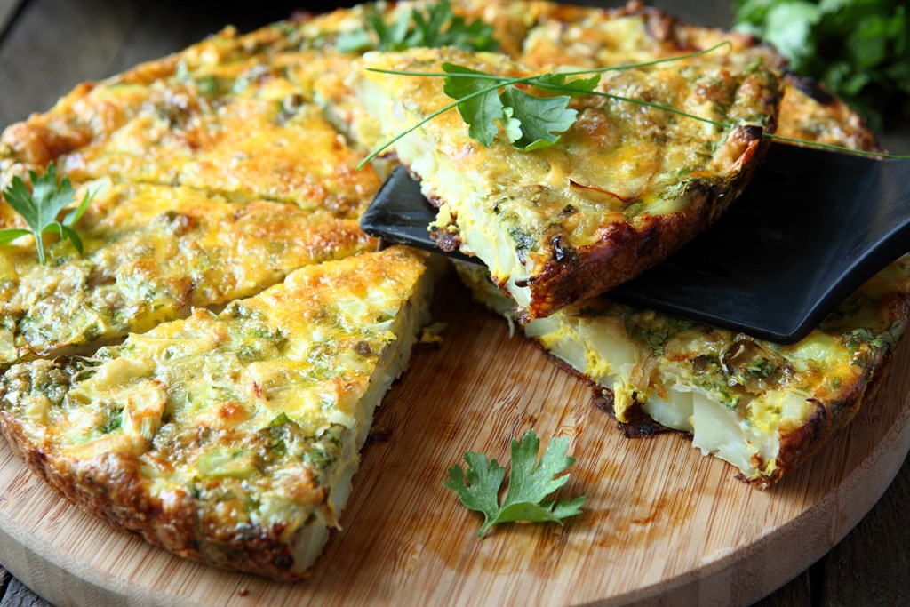 Italian Frittata with slices of fresh greens.