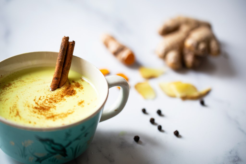 A soothing, healthy and delicious drink made of coconut and/or almond milk with turmeric, ginger, cinnamon and pepper. The bright yellow color comes from the turmeric root.