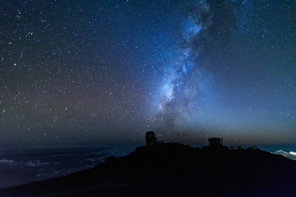 The Haleakala Observatory with the Milky Way on the island of Maui in the Hawaiian islands.