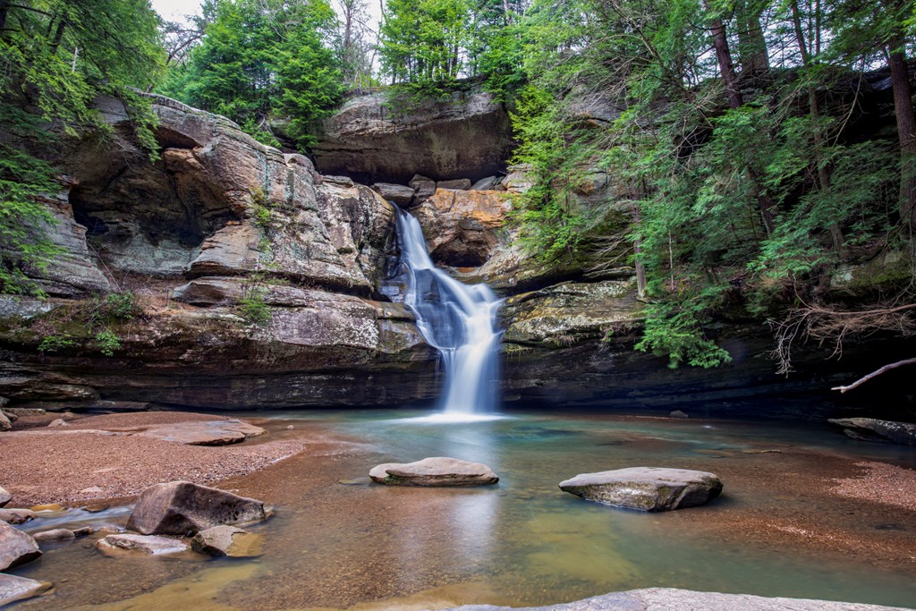 Waterfall over Cliff and Rocks at Hocking Hills State Park, Ohio, USA