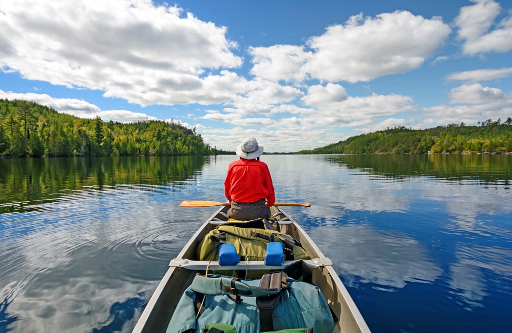 Canoer on Kekekabic Lake in the Boundary Waters in Minnesota.