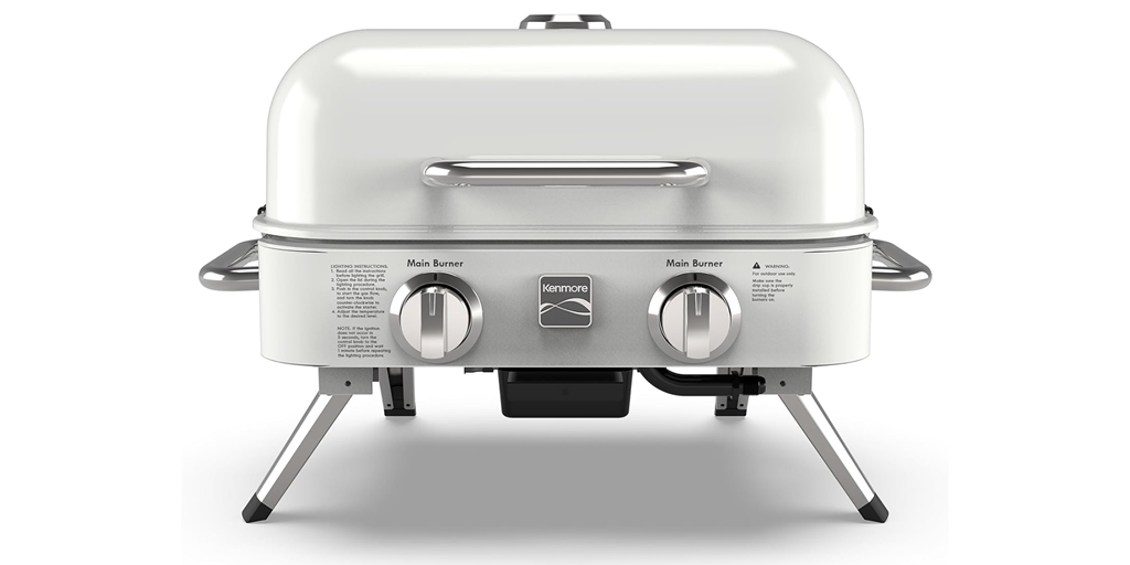 Small, portable grill on a white background.