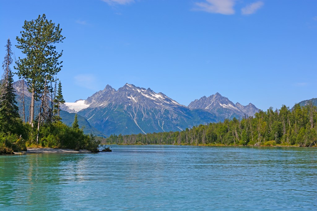 Calm Waters and Beautiful Skies on a Mountain Lake on Crescent Lake in Lake Clark National Park in Alaska