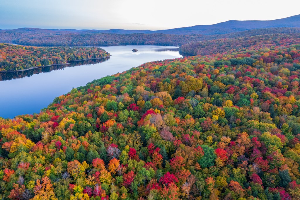 Aerial view of the colorful foliage at Lake Whitingham (The Harriman Reservoir) in the Green Mountains of Vermont.