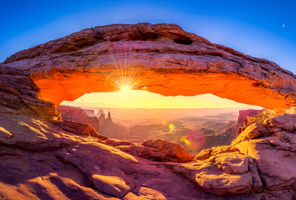 Sunrise at iconic Mesa Arch in Canyonlands National Park.