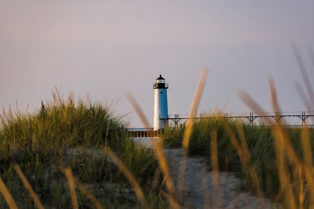 Manistee Lighthouse during a fall sunset.