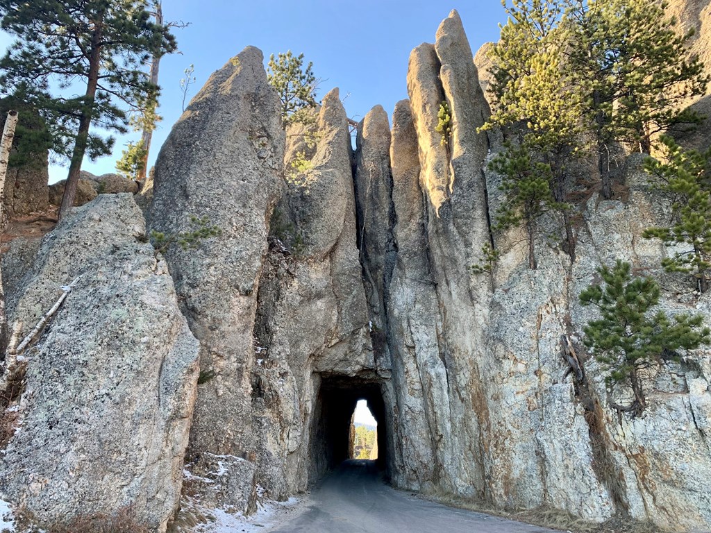 A one way tunnel, Needles Eye Tunnel at Custer State Park in South Dakota. A narrow tunnel through a large rock outcropping.