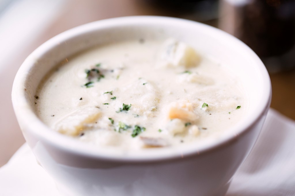 Creamy bowl of New England clam chowder.